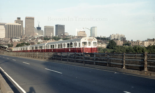 Train of MBTA Red Line 01400s Crossing Longfellow Bridge from Boston 1967 #2
